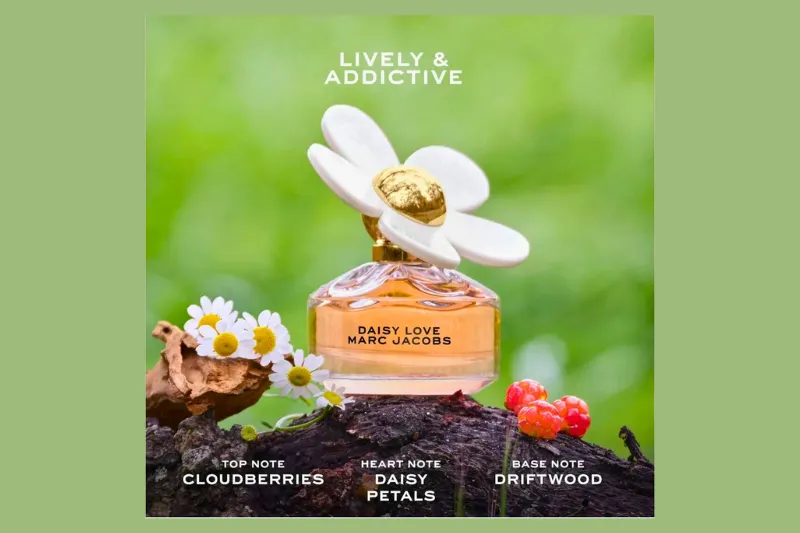 Marc Jacobs Daisy 100ml em cenário natural com fundo verde iluminado.