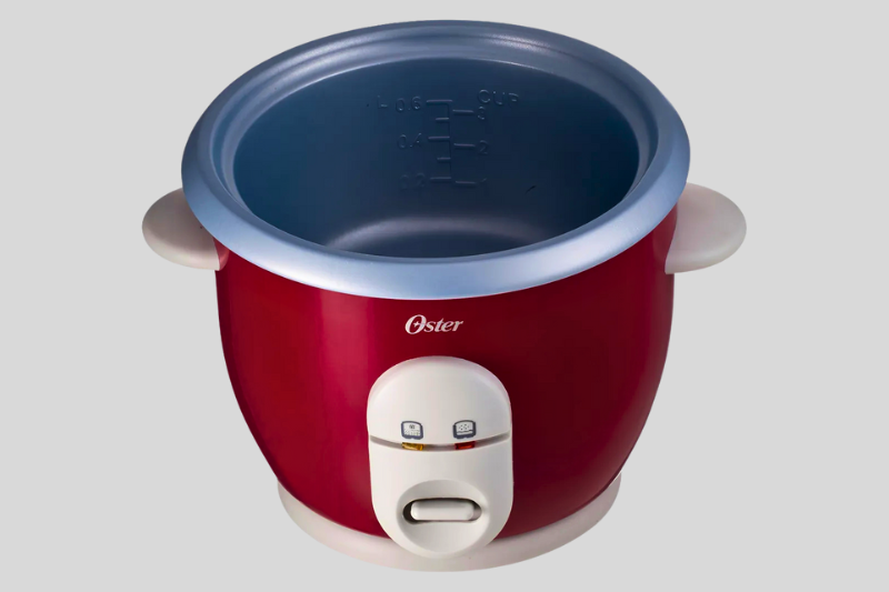 Panela Elétrica Mondial Pratic Rice com tampa de vidro temperado e saída de vapor.