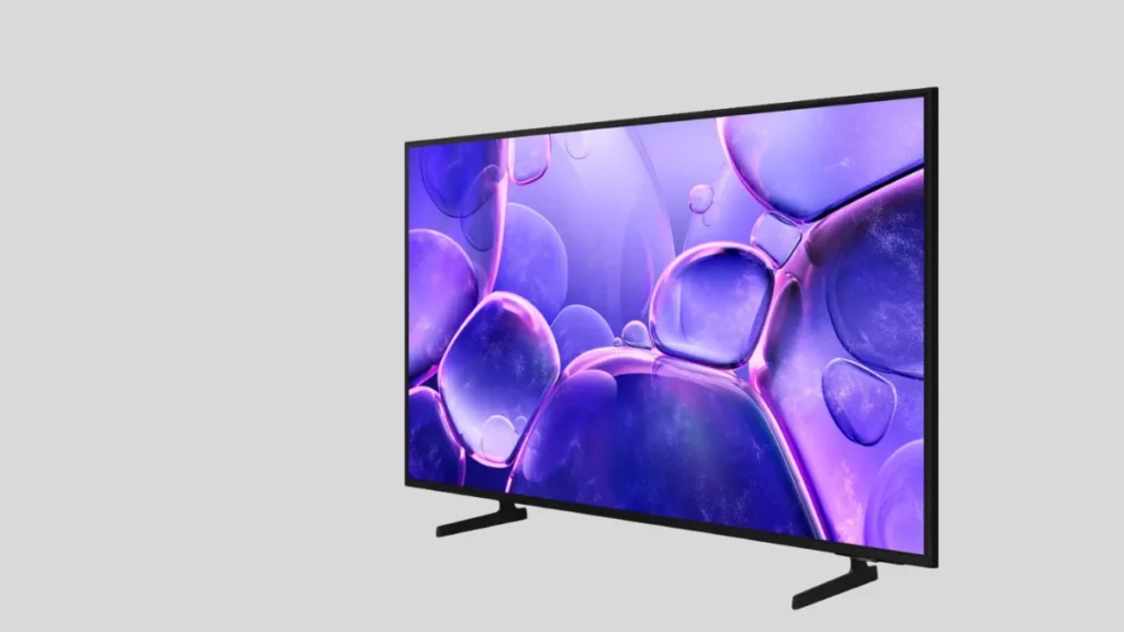 Smart TV barata com tela moderna exibindo imagem vibrante em fundo escuro